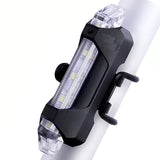 Rechargeable LED bicycle light with USB charging port for convenient power.