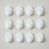 Close up of a strong self adhesive hook showing compact design