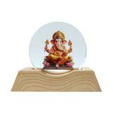 Spiritual 3D Lord Ganesha LED night lamp glowing warmly in a dark room
