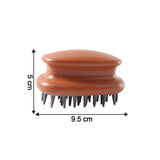 Detailed close-up of flexible bristles on scalp massage brush