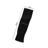 Black elbow compression sleeve on arm showing flexible fabric