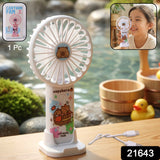 Rechargeable handheld fan featuring cartoon capybara design used as a hand fan