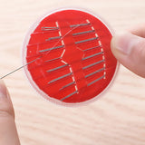 Essential stitching kit components like needles and thread organized