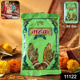 Hands decorated with intricate dark Herbal Mehndi Powder henna designs