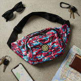 Close-up view of multiple compartments in waist and sling bag