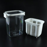 Complete yogurt maker set with strainer basket and lid ready for use.
