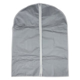 Hanging garment covers protecting clothes inside a closet